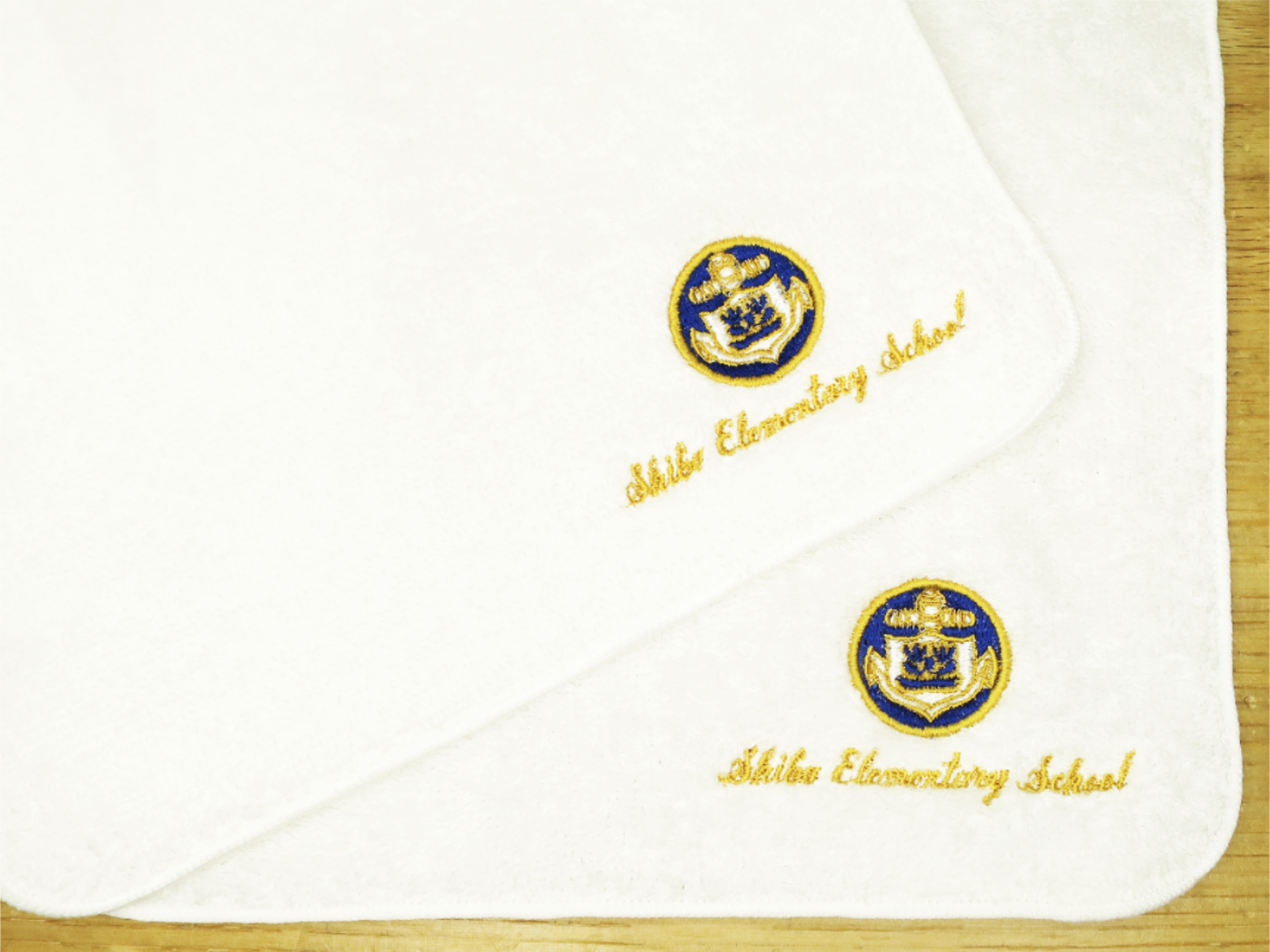 港区立芝小学校同窓会様｜記念品ハンドタオル刺繍