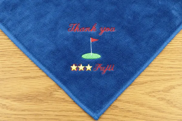 ホールインワン記念のお返し用として制作した「Thank you」刺繍入りゴルフモチーフのネイビーハンドタオル