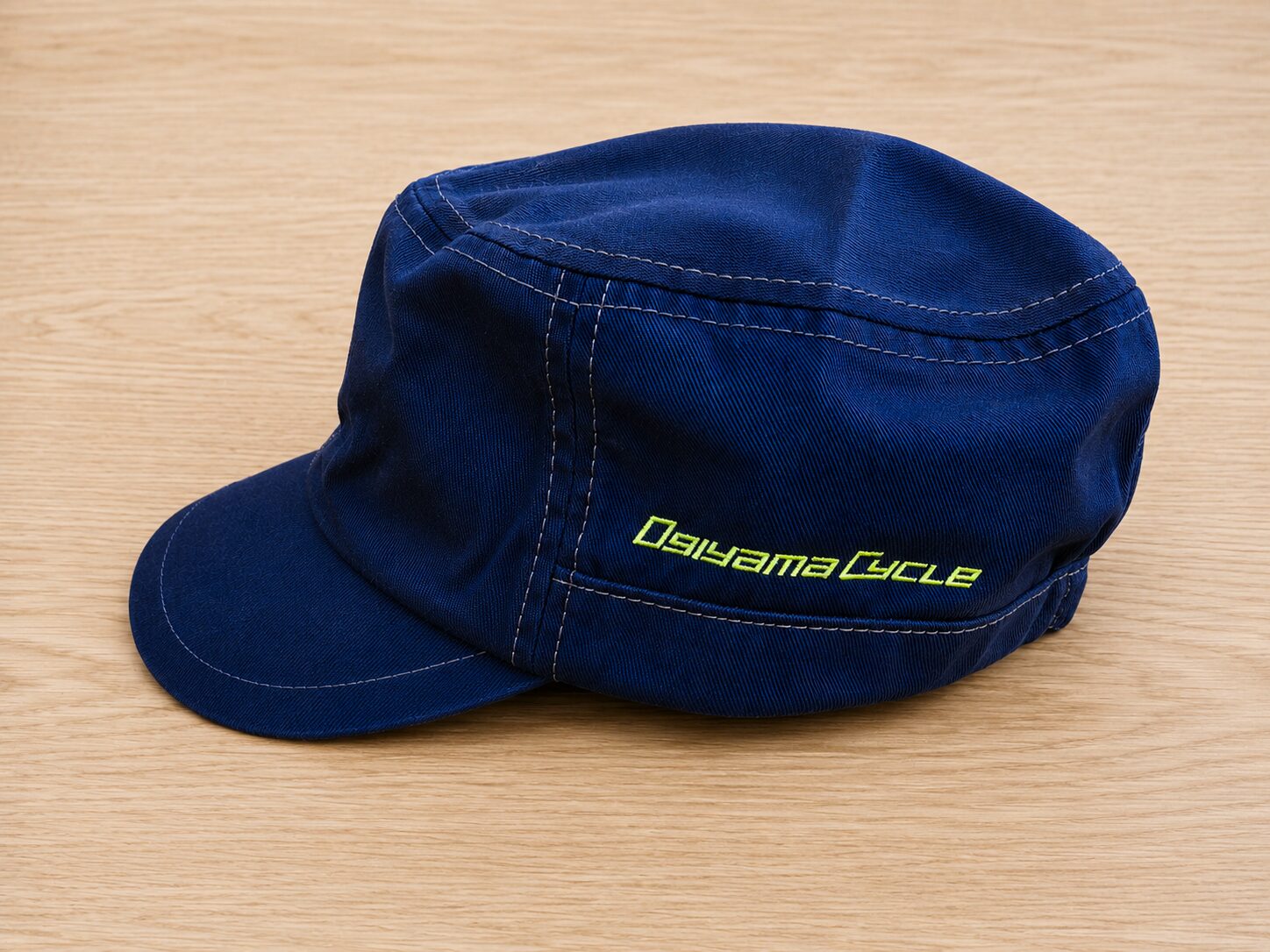 大田区のサイクルショップ「オギヤマサイクル」様 持ち込みキャップへのロゴ刺繍｜オリジナル帽子制作事例