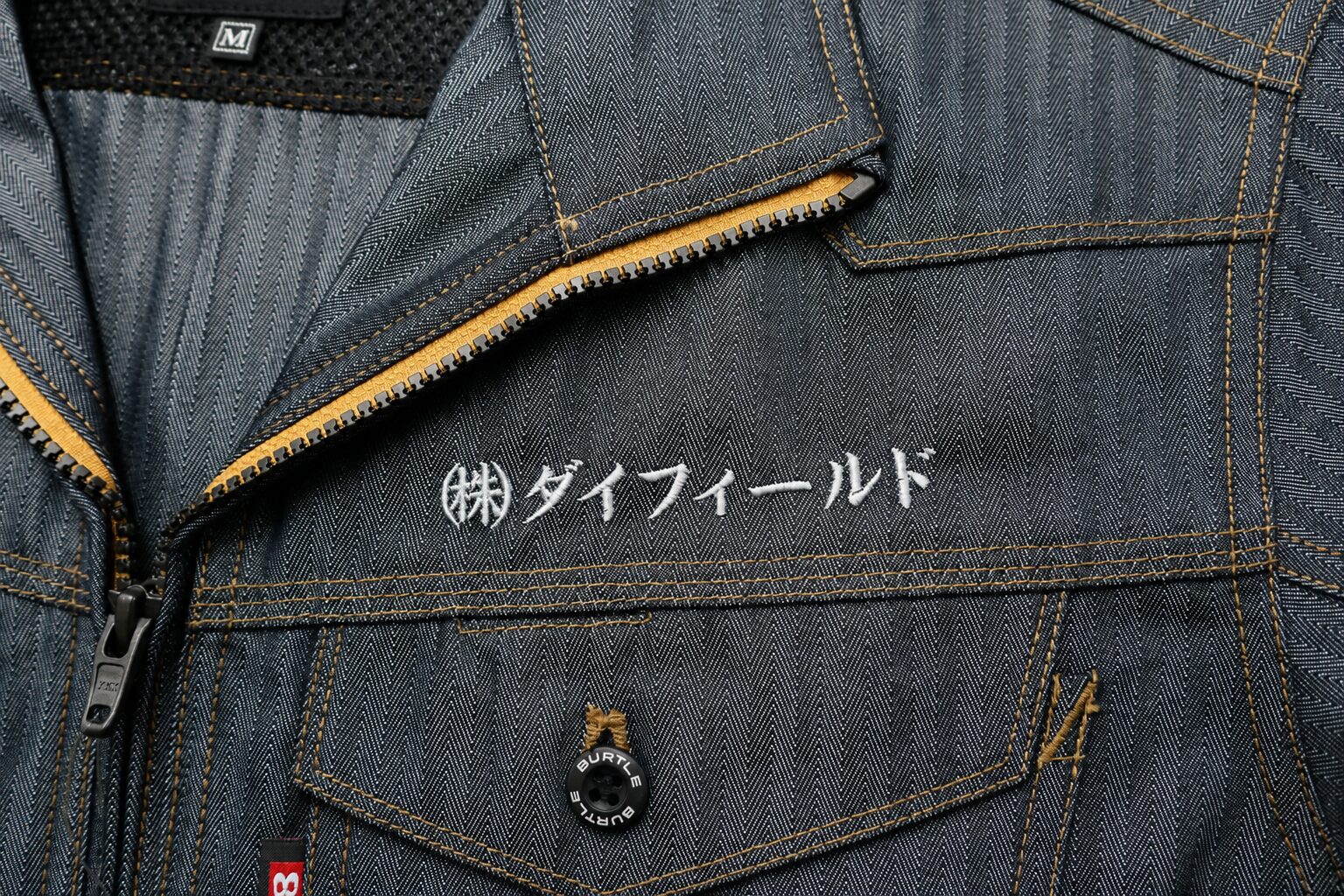 作業着へ会社名刺繍｜東京都大田区のユニフォーム刺繍制作実績